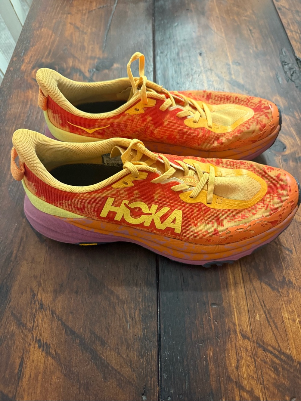 Hoka Orange and Pink Gradient Trail Running Shoes